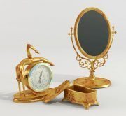Golden clock, casket and mirror