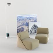 Armchair, pictures and floor lamp