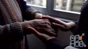 MotionArray – Nurse Holds Elderly Patient's Hands 477005