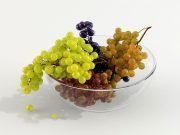 Bunches of grapes in glass vase
