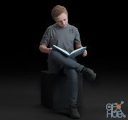 Boy sitting and reading a book (3D-Scan)