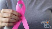 MotionArray – Woman Holds Pink Ribbon 1036066