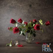 Bouquet of red roses and a candle