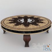 Round table with carved pattern