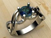 White metal ring with blue stone