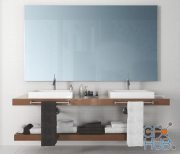 Two sinks and a large mirror