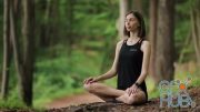 MotionArray – Woman Practising Yoga Outdoors 1034682