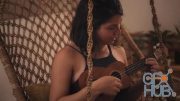 MotionArray – Woman Playing On Ukulele Guitar 1029139