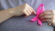 MotionArray – Woman Holding Pink Ribbon 1034787