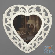 Heart-shaped mirror in a carved frame