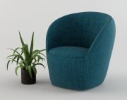 Modern armchair and plant