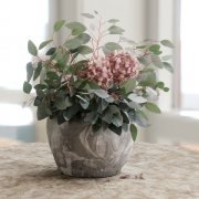 Bouquet of eucalyptus and hydrangeas in pot