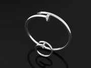 Bracelet and ring of white metal