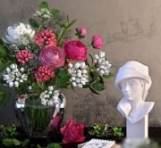 Flowers and gypsum bust