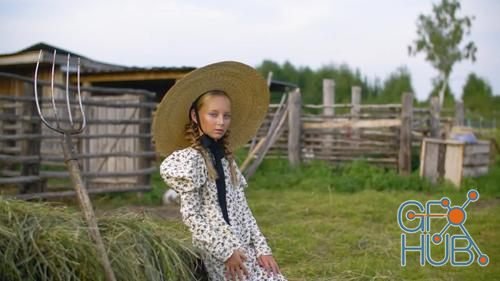 MotionArray – Country Girl Near Haystack With Hayfork 1026810